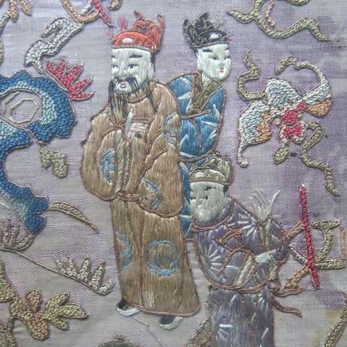 441A - A Chinese silk embroidered panel, purple damask backing with vertical strips of figural garden and l... 