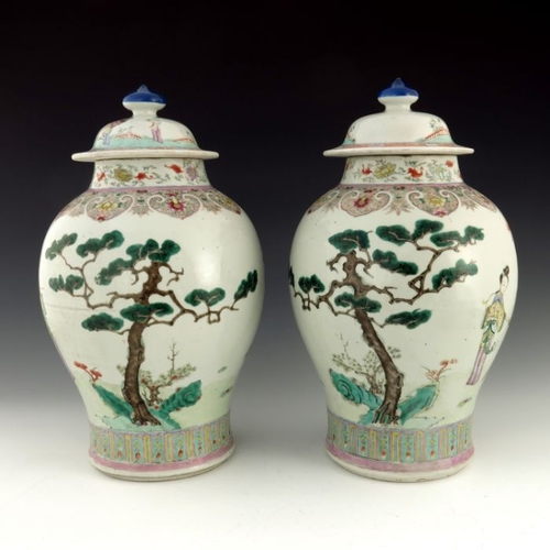 450A - A pair of 18th/19th Century Chinese vases and covers, of bombe form, domed covers with finials, deco... 