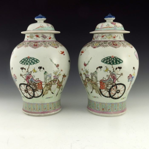 450A - A pair of 18th/19th Century Chinese vases and covers, of bombe form, domed covers with finials, deco... 