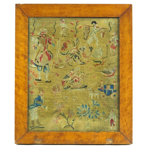 481A - A woolwork pictorial sampler, mid 19th Century, depicting figures in various poses, foliage and a ho... 