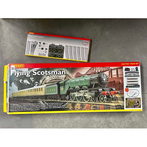 89 - A Hornby R1019 Flying Scotsman 00 gauge electric train set and a Track pack system R8017