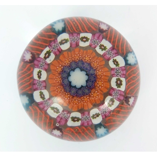 751 - Paul Ysart, a paperweight, concentric millefiori with orange and gold twists, 7.5cm wide