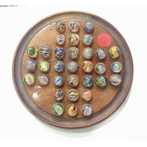 28 - Four solitaire boards with a large number of swirl marbles, 246 marbles in total, to include 16 brow... 