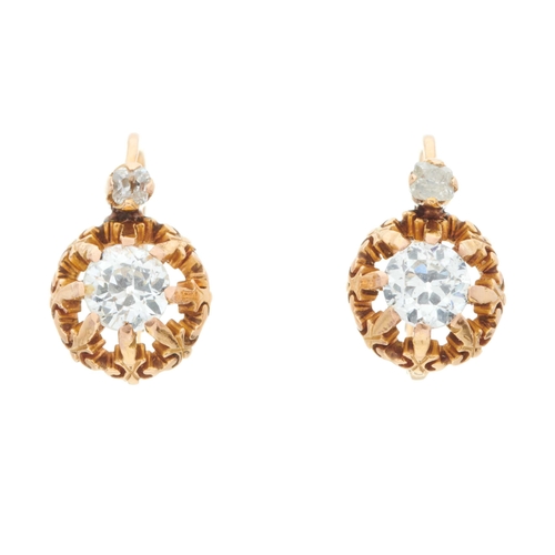14 - A pair of early 20th century 18ct gold old-cut diamond earrings, with similarly-cut diamond surmount... 