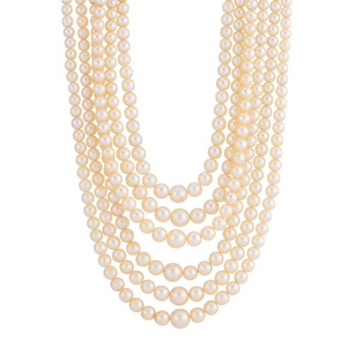 29 - A mid 20th century multi-row graduated cultured pearl choker necklace, with platinum vari-cut diamon... 