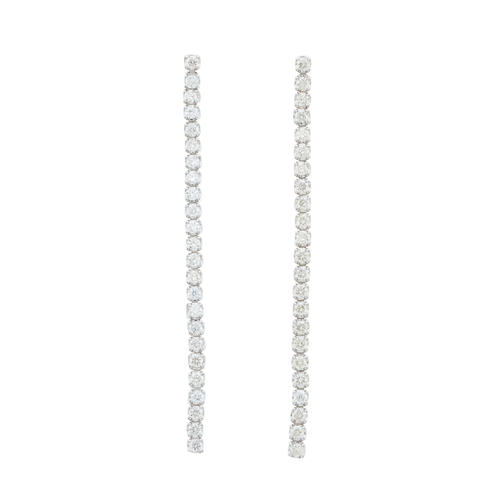 55 - A pair of 18ct gold brilliant-cut diamond line articulated drop earrings, total diamond weight 1ct, ... 