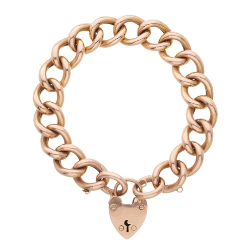 6 - An early 20th century 9ct gold curb-link bracelet, with heart-shape padlock clasp, stamped 9c, lengt... 