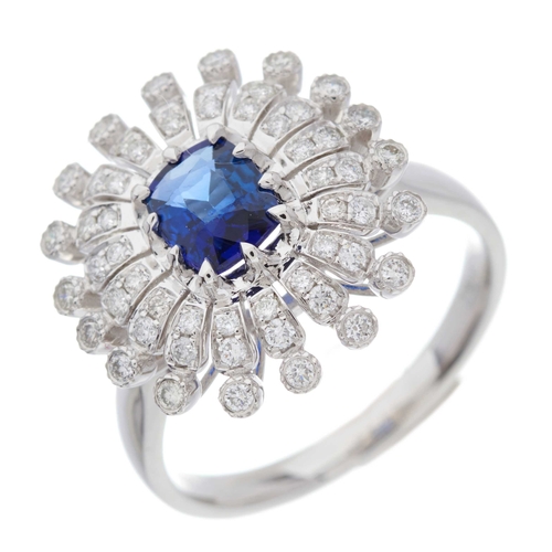 62 - An 18ct gold cushion-shape sapphire and brilliant-cut diamond floral dress ring, sapphire weight 0.8... 