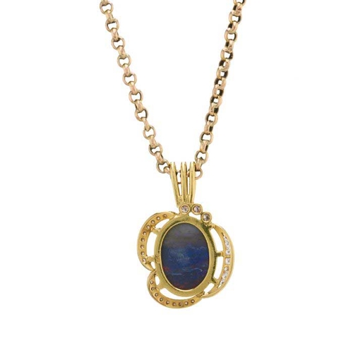 86 - An 18ct gold black opal cabochon and brilliant-cut diamond pendant, suspended from an early 20th cen... 