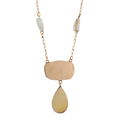 105 - A mid 20th century 14ct gold boulder opal pendant, with mother-of-pearl pear-shape drop, suspended f... 