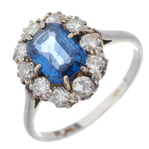 107 - A mid 20th century platinum, rectangular-shape sapphire and circular-cut diamond cluster ring, sapph... 