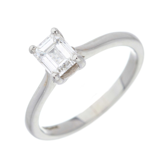 129 - A platinum rectangular-shape diamond single-stone ring, diamond laser inscribed 14228680, correspond... 