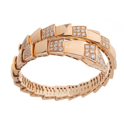 Bulgari, an 18ct rose gold Serpenti Viper flexible bangle bracelet,  demi-pave set throughout with br