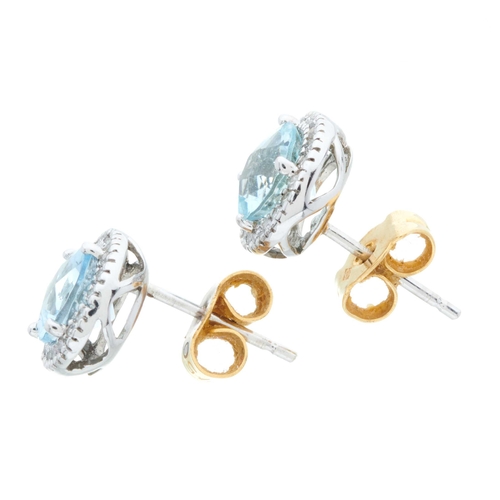 181 - A pair of 14ct gold aquamarine and brilliant-cut diamond cluster stud earrings, estimated total diam... 