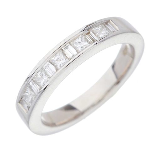 191 - An 18ct gold vari-cut diamond band ring, designed as an alternating square-shape and baguette-cut di... 