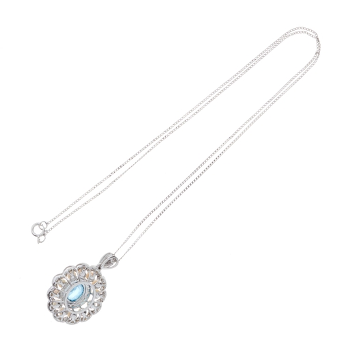 199 - An 18ct gold aquamarine, brilliant-cut diamond and seed pearl cluster pendant, suspended from a flat... 