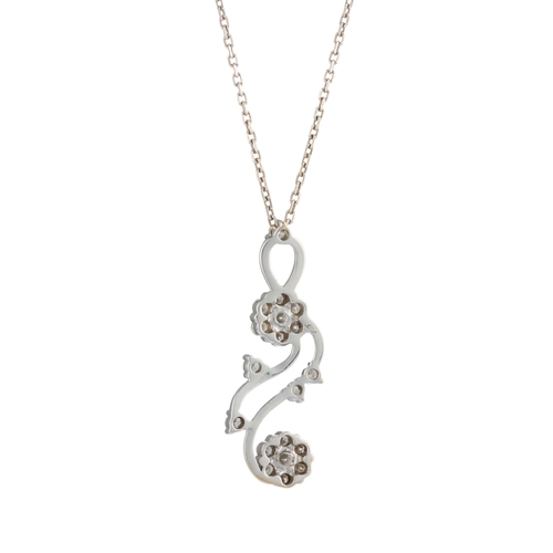 204 - An 18ct gold brilliant-cut diamond floral cluster pendant, suspended from a trace-link chain, estima... 