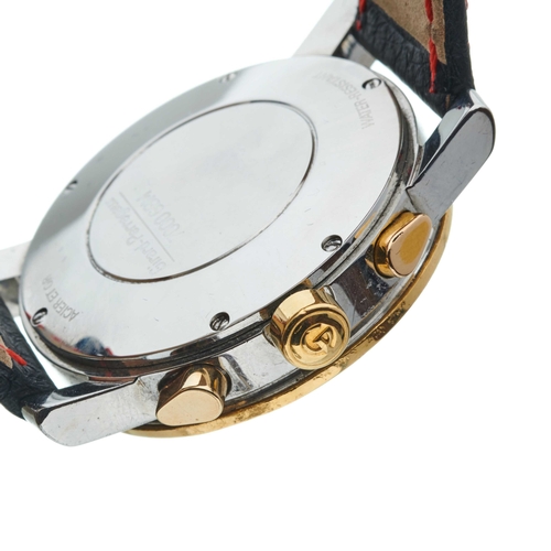 237 - Girard-Perregaux, a stainless steel and 18ct gold chronograph wrist watch, red dial, reference 7000 ... 