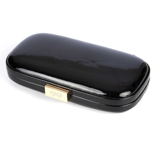 266 - Anya Hindmarch, a black patent leather box clutch, featuring a gold-tone logo engraved top latch fas... 