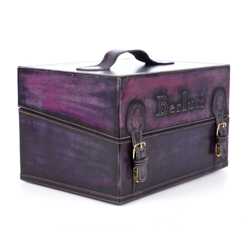 273 - Berluti, a leather shoe cleaning case, featuring a distressed purple leather exterior, with a flat t... 