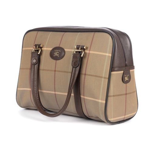 285 - Burberry, a vintage Boston bag, designed with a green check canvas exterior and brown leather trim, ... 