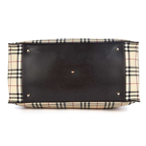 287 - Burberry, a Nova Check holdall luggage bag, designed with the maker's Nova check nylon exterior and ... 