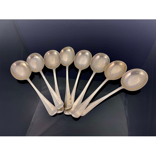 106 - A set of eight George V silver soup spoons, Josiah Williams and Co., London 1920, Hanoverian Rat Tai... 