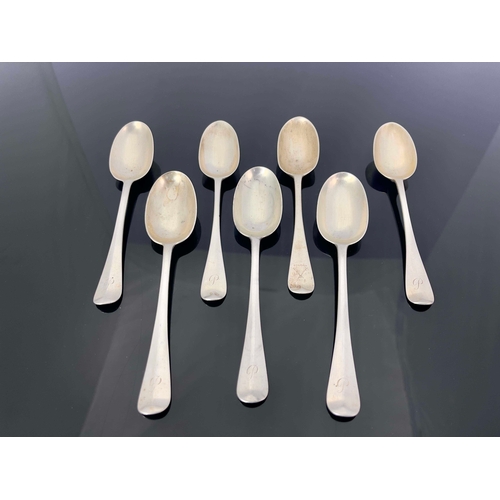 110 - A matched set of seven Victorian and George V silver dessert spoons, Josiah Williams and Sons, Londo... 