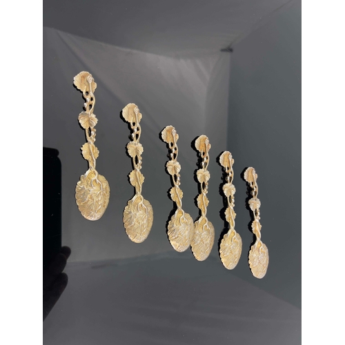 118 - A set of six Victorian silver gilt teaspoons, Saunders and Shepherd, London 1890, cast vine design a... 