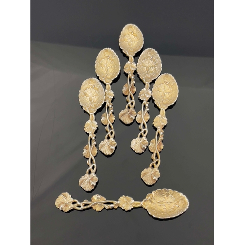 118 - A set of six Victorian silver gilt teaspoons, Saunders and Shepherd, London 1890, cast vine design a... 