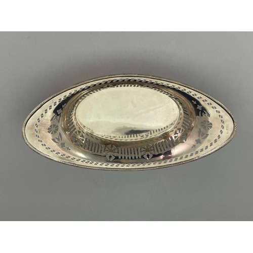 134 - A George V silver fretwork bowl, Barker Brothers, Chester 1917, pierced boat form, reeded and foliat... 