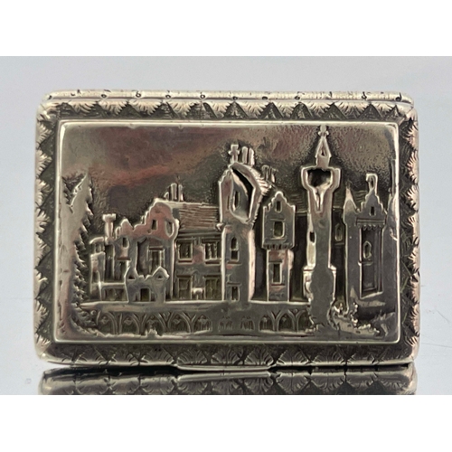 144 - A silver castle top vinaigrette, George Wish, London, cast and chased with Abbotsford house within f... 