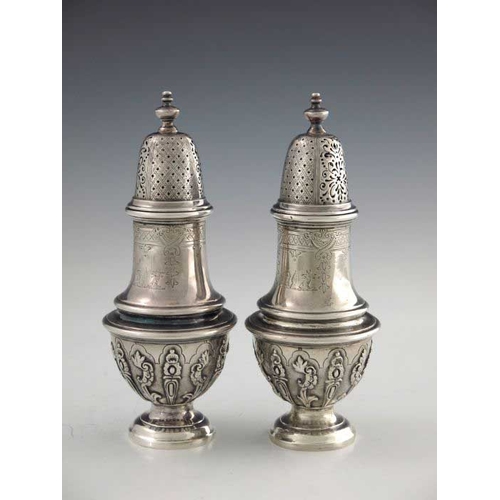 164 - A pair of Victorian silver casters, Robert Garrard II, London 1856, cast baluster form, engraved wit... 