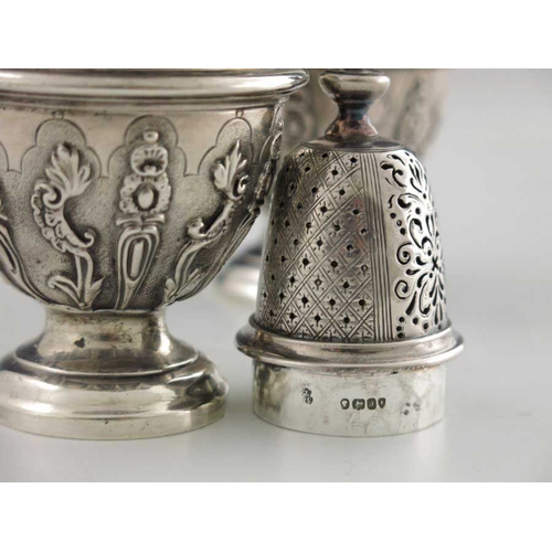 164 - A pair of Victorian silver casters, Robert Garrard II, London 1856, cast baluster form, engraved wit... 