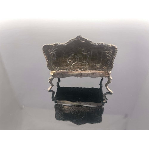 170 - An Edwardian silver miniature settee, Theodor Hartmann, London 1902, chased with scenes after Wattea... 