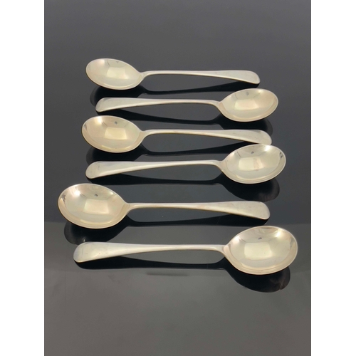 173 - A set of six George V silver soup spoons, Walker and Hall, Sheffield 1918, Old English pattern with ... 