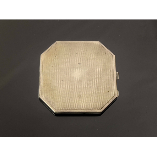 177 - A George VI silver and enamelled compact, Deakin and Francis, Birmingham 1936, canted square form, c... 