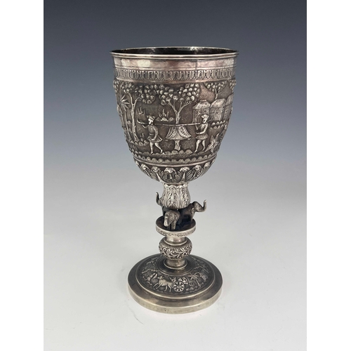 183 - A large Indian white metal trophy, circa 1900, embossed with Hindu village scene, engraved for the L... 