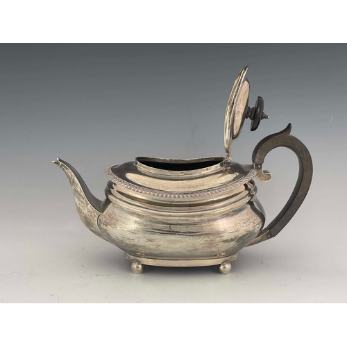 184 - An Edwardian silver teapot, C S Harris and Sons, London 1906, shouldered boat form with reeded rim a... 