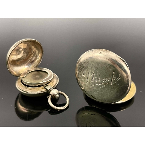 196 - An Edwardian silver fob stamp case and a Victorian sovereign case, Miller Brothers, Birmingham 1908 ... 