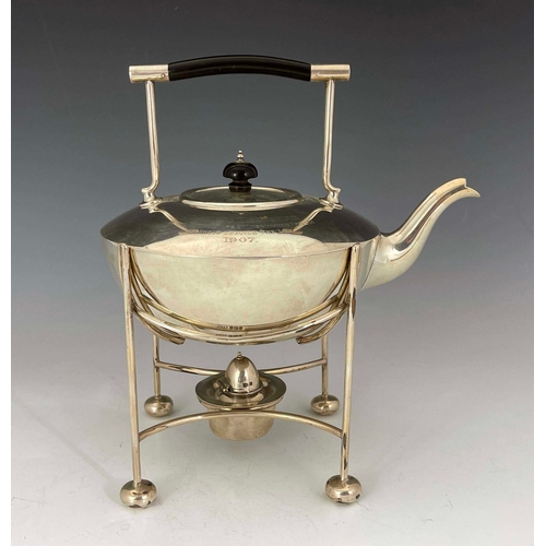 226 - An Arts and Crafts silver kettle and stand, Mappin and Webb, Sheffield 1906, the squat rounded body ... 