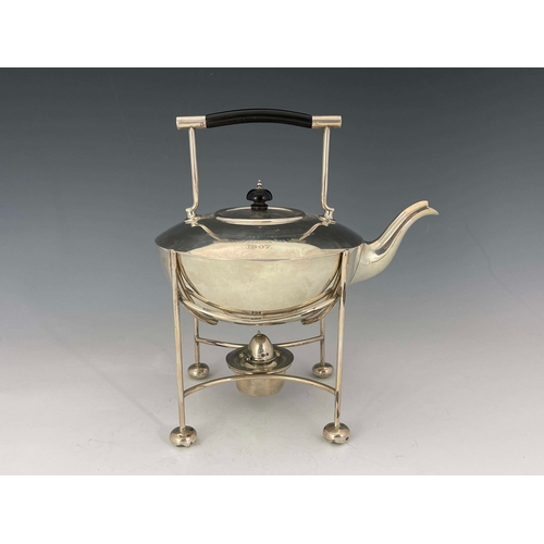 226 - An Arts and Crafts silver kettle and stand, Mappin and Webb, Sheffield 1906, the squat rounded body ... 