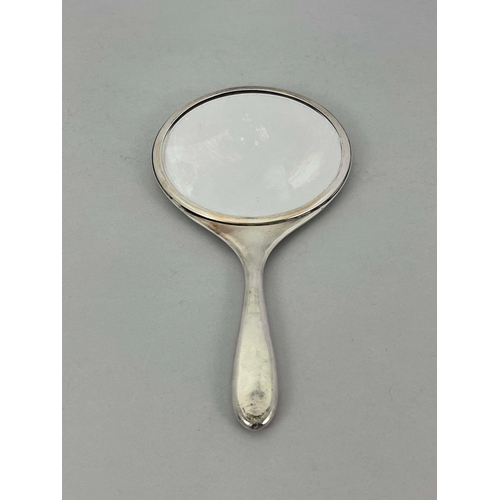 230 - Archibald Knox for Liberty and Co., an Arts and Crafts silver and enamelled hand mirror, Birmingham ... 