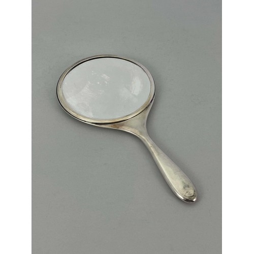 230 - Archibald Knox for Liberty and Co., an Arts and Crafts silver and enamelled hand mirror, Birmingham ... 