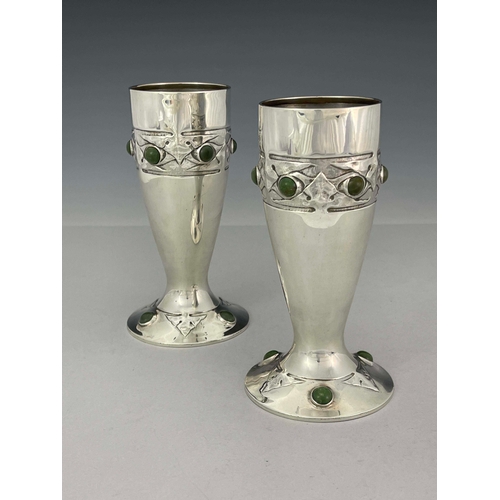 239 - Archibald Knox for Liberty and Co., a pair of Arts and Crafts Cymric silver and cabochon set vases, ... 