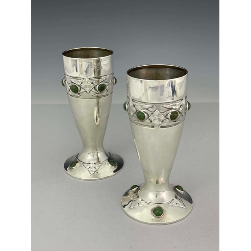 239 - Archibald Knox for Liberty and Co., a pair of Arts and Crafts Cymric silver and cabochon set vases, ... 