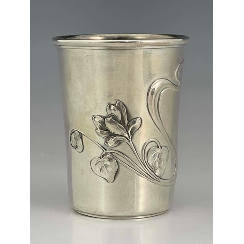 240 - An Austrian secessionist silver beaker, embossed in the Art Nouveau style with foliate tendrils, 7.5... 