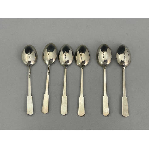 254 - A set of six Art Deco silver and enamelled teaspoons, Turner and Simpson, Birmingham 1931, arrow for... 