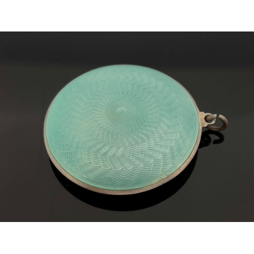 255 - An Art Deco silver and enamelled pendant compact, Turner and Simpson, Birmingham 1927, circular lens... 