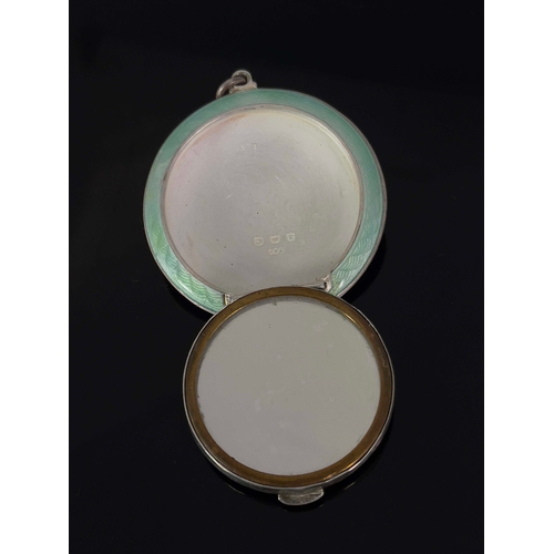 255 - An Art Deco silver and enamelled pendant compact, Turner and Simpson, Birmingham 1927, circular lens... 